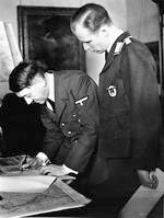 Adolf Hitler signs the call to the German nation in the Reich Chancellery after Great Britain and France declare war to Germany